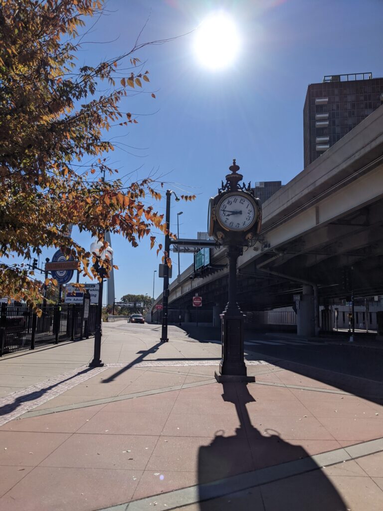 Old Street Clock who's face is rotated so 11 is up