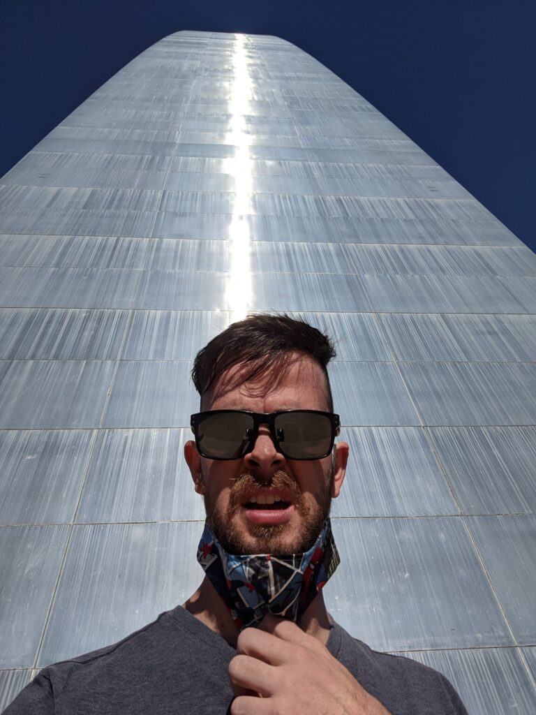 ALex at the base of the Arch